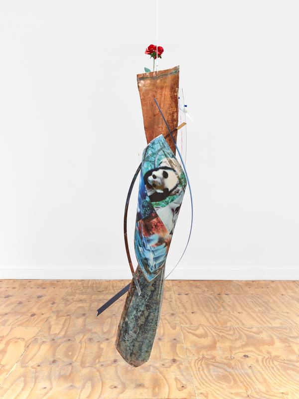 Louis Osmosis,  Centrifugal Pickle #1 (Fly Trap) , 2024. Reclaimed copper, lenticular print, toy airplane, artificial rose, plastic, spray paint, enamel paint, epoxy, wire rope. 75 x 16 x 20 inches.