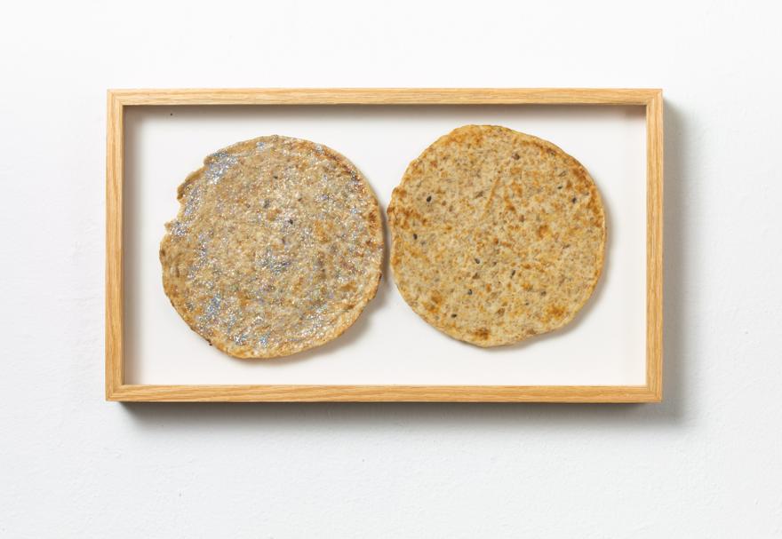 Hannah Beerman , Glitter Pita , 2020. Pita bread, MDF board, oak. Framed: 9 1/4 x 16 1/2 inches.