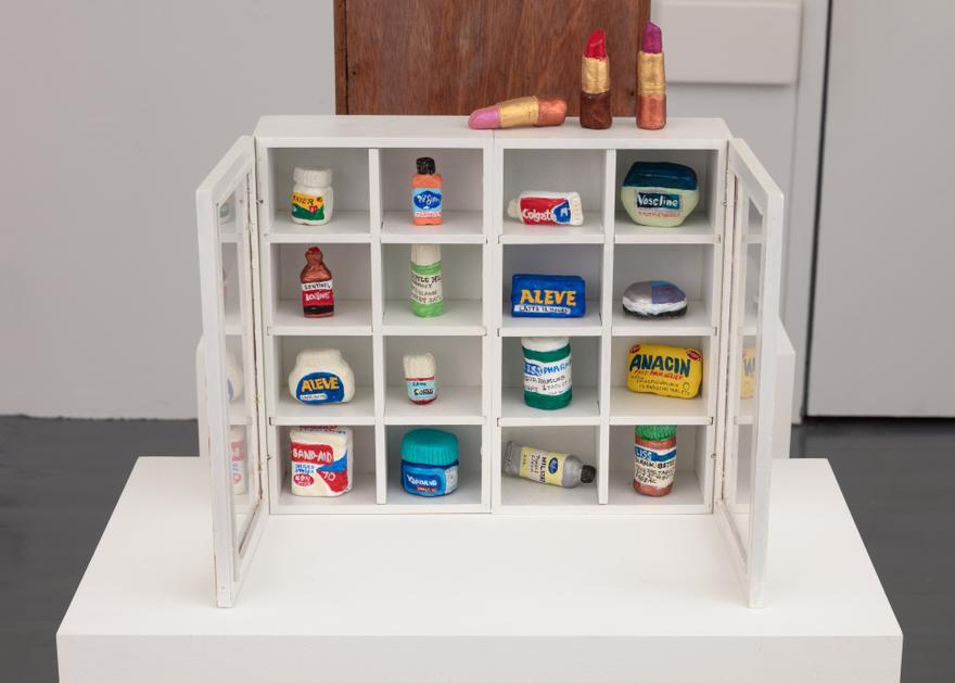 Bette Blank , Medicine Cabinet 2 , 2017. Enamel on clay in wooden box . 15 x 12 1/2 x 3 3/4 inches.
