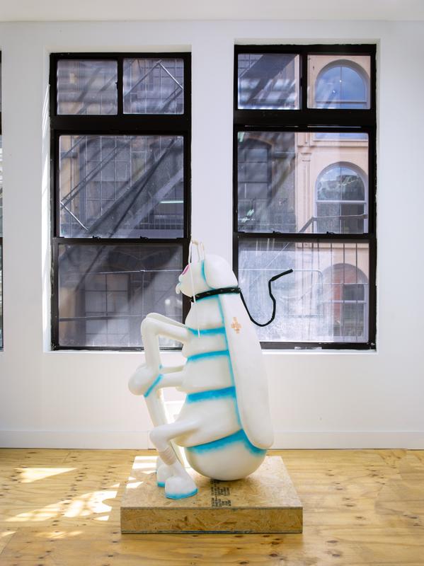 Louis Osmosis ,   Companion (Hachikō) , 2022. Reinforced paper-mache, polystyrene, epoxy clay, acrylic paint, armature wire, MDF, plywood, PVC pipe, acrylic paint, velveteen, studs, adhesive, medical gauze. 40 x 40 x 59 inches.