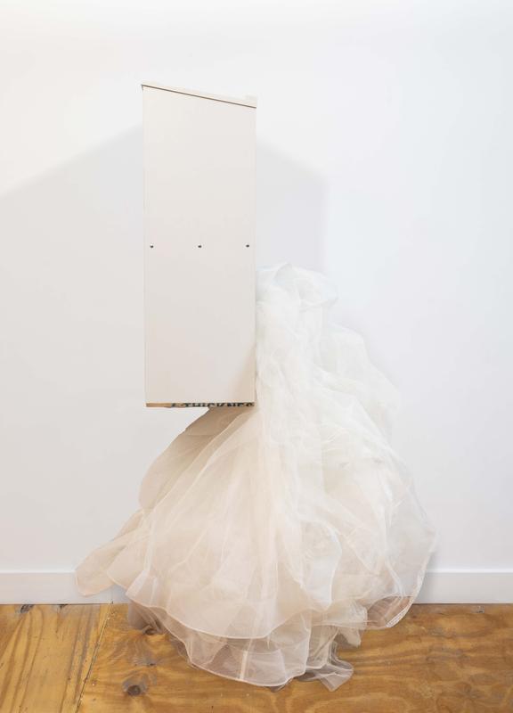 Louis Osmosis , Content House, for Los Angeles , 2024. Podium, wedding dress, PVC pipe, plywood, lath screws. 76 x 24 x 24 inches.