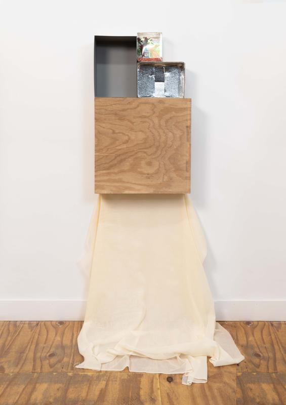 Louis Osmosis ,   Content House, for New York , 2024. Various found boxes, plywood, nylon. 79 x 36 x 15 inches.