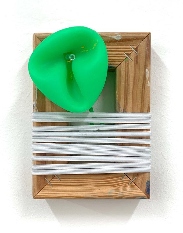 Hannah Beerman ,   Untitled (Peep Show for the Holy City) , 2021. Elastic, rubber, tack on wood. 5 x 8 inches.