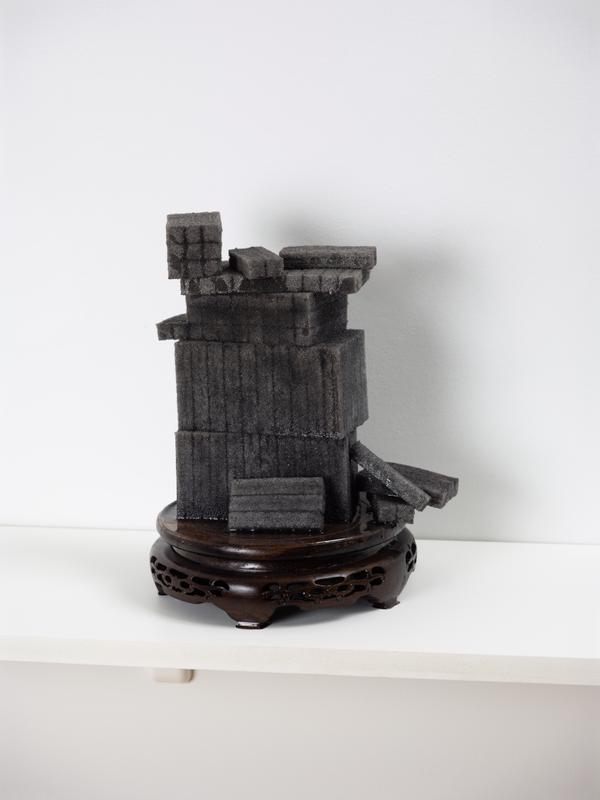 Louis Osmosis ,   Stack (New Museum) , 2022. Pick-and-pluck foam, resin, rosewood base. 9 x 8 x 11 inches.