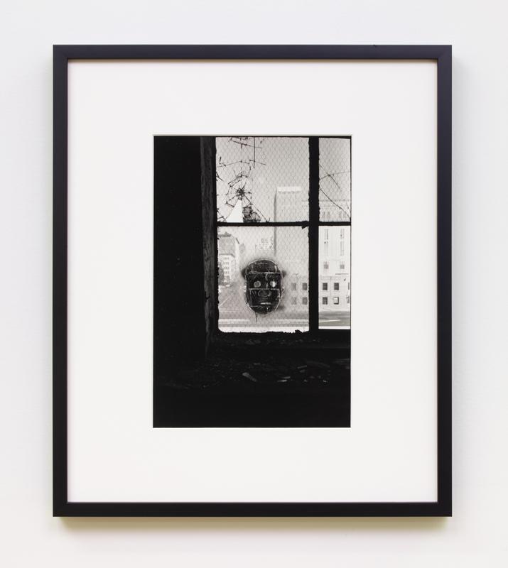 Stanley Stellar ,   Glass Mask , 1983. Signed and dated 'Stanley Stellar 1983' on verso. Gelatin silver print. 14 x 11 inches.