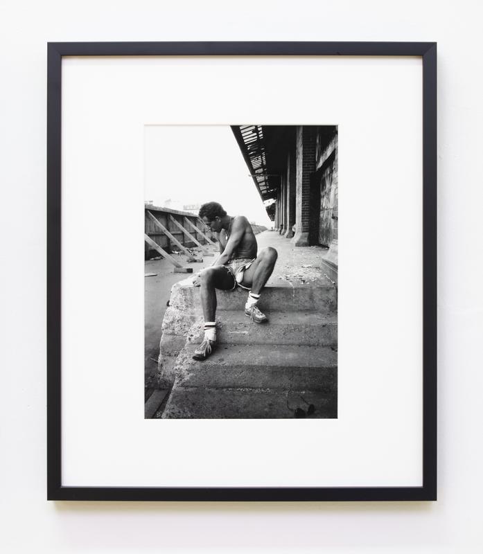 Stanley Stellar ,   Rolling a Joint , 1982. Signed and dated 'Stanley Stellar 1982' on verso. Gelatin silver print. 14 x 11 inches.
