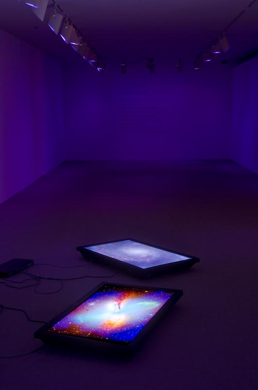 Dark Matter, 2003 Two (2) video monitors, two (2) media players and Lee filters Dimensions variable Installation view, University Gallery, University of Massachusetts Amherst, Amherst, Massachusetts, 2007