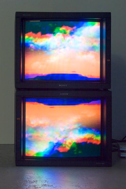 Surface Effect, 1997 Two (2) video monitors, two (2) media players Dimensions variable  