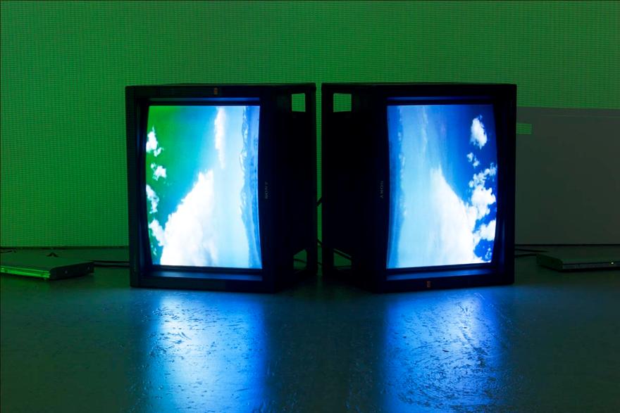 Shimmer , 1997 Two (2) video monitors, two (2) media players Dimensions variable 