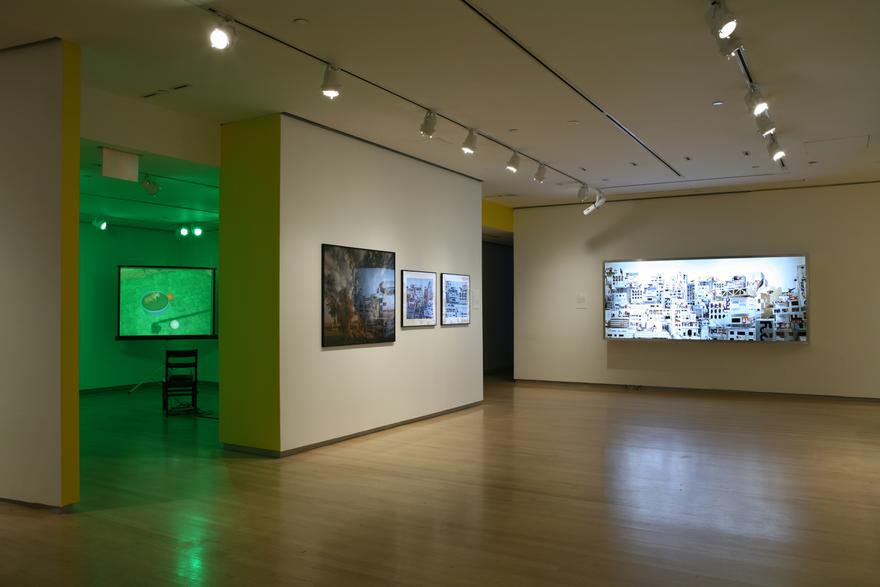 Perfect Devotion Two, 2005 One (1) video projector, one (1) media player, one (1) screen on a tripod, one (1) wooden chair, green gels and existing architecture Dimensions variable Installation International Center fro Photography, New York, New York, 2006