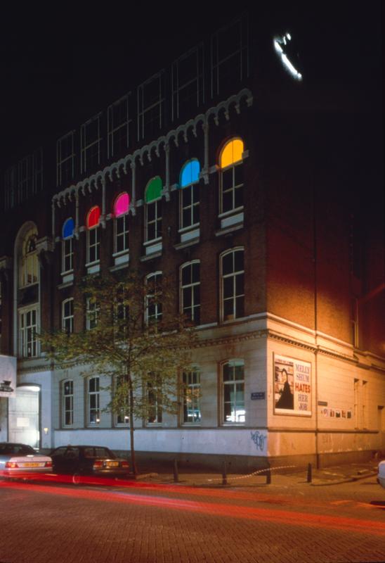 Abyss of Light , 1993 Three (3) video projectors, three (3) media players, one (1) synchronizer, Lee Filters and existing architecture Installation view, Exterior, Witte de with, Rotterdam, Netherlands, 1994 