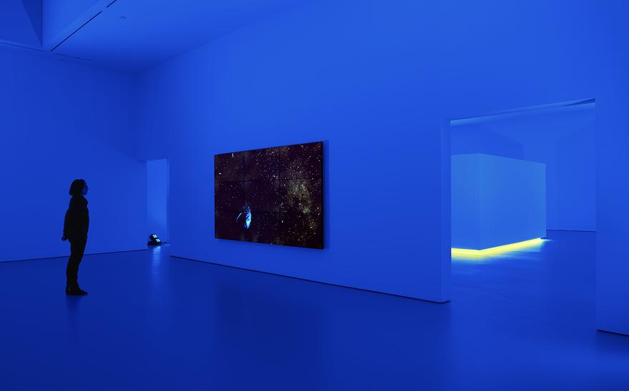 Sidereus Nuncius , 2014 Nine (9) monitor video wall 68 3/8 x 121 x 3 5/8 inches  Science, Fiction , 2014 Installation for two (2) video projectors, one (1) watchout system, and lights Dimensions Variable Installation view, David Zwirner Gallery, New York, 2015