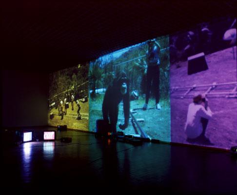 Electric Mind, 1996 Six (6) video projectors, two (2) video monitors, eight (8) media players, one (1) synchronizer, Lee filters and existing architecture Installation view, Salzburger Kunstverein, Salzburg , Austria, 1996