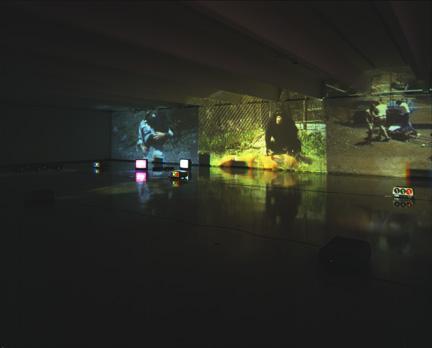 Electric Mind, 1996 Six (6) video projectors, two (2) video monitors, eight (8) media players, one (1) synchronizer, Lee filters and existing architecture Installation view, Walker Art Center, Minneapolis, MN, 1997