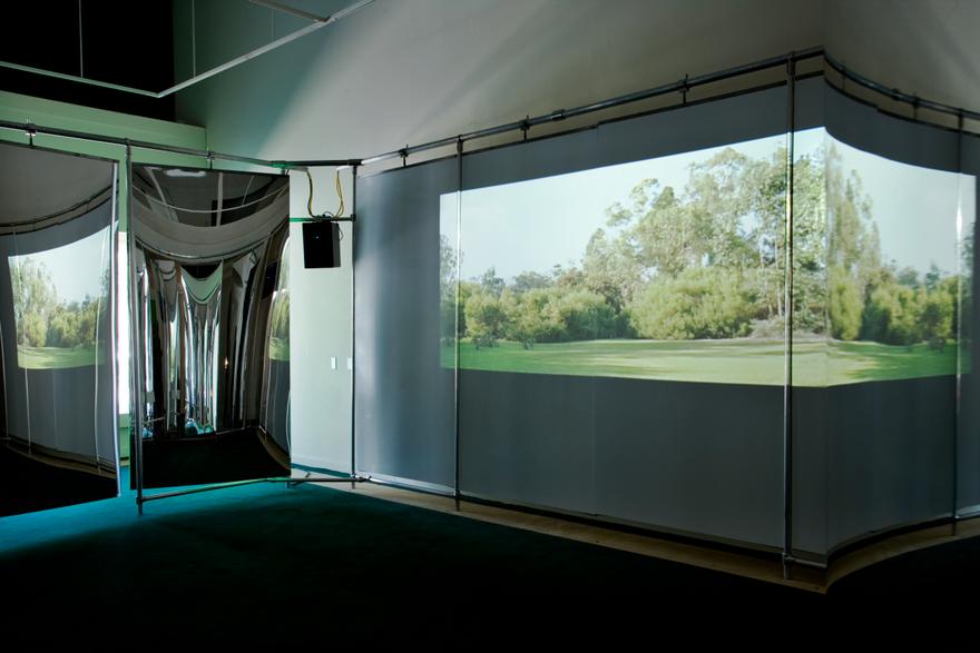 relay , 2007 One (1) media player with 5.1 Surround Encoder, one (1) video projector, four (4) speakers, Plexiglas, aluminum and fluorescent tubes Installation view, West of Rome, Los Angeles, 2007  Photo by Fredrik Nislen