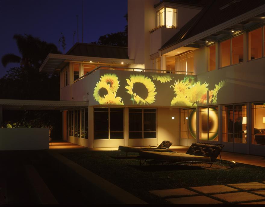 Untitled, Commissioned work for a private residence , 2003 One (1) video projector, one (1) media player, custom designed outdoor projector hanger Installation view, Brentwood, CA, 2003 