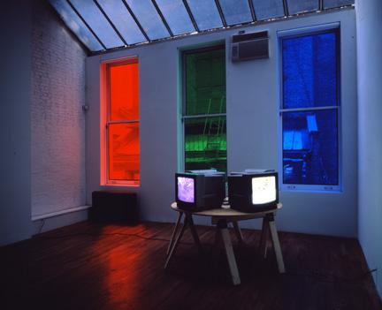 Perspective is an Energy , 1995 Four (4) video monitors, four (4) media players, plywood tale top, two (2) saw horses  Installation view, David Zwirner, New York, NY, 1996 