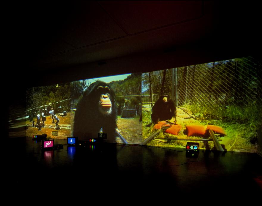 Electric Mind , 1996 Six (6) video projectors, two (2) video monitors, eight (8) media players, one (1) synchronizer, Lee filters and existing architecture Dimensions variable Installation view, Portland Museum of Art, Portland, Oregon, 1996