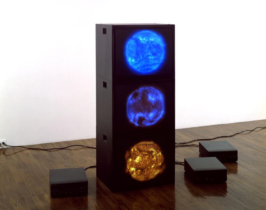 Red Magenta Blue Suns, 2000 Three (3) video monitors, three (3) media players Dimensions variable  
