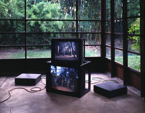 The best outside is the inside , 1998 Three (3) video projectors, three (3) media players, free standing wall and existing architecture Dimensions variable Installation view, MAK Center for Art + Architecture, 1998