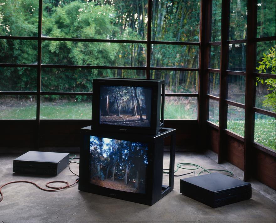 The best outside is the inside , 1998 Three (3) video projectors, three (3) media players, free standing wall and existing architecture Dimensions variable Installation view, MAK Center for Art + Architecture, 1998