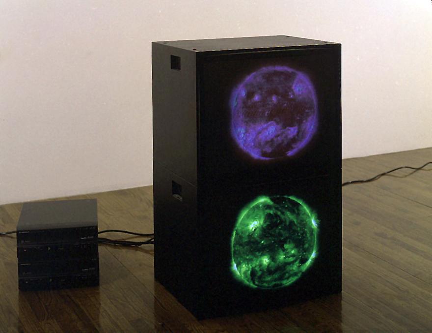 Magenta Green Suns , 2000 Two (2) video monitors, two (2) media players Dimensions variable 