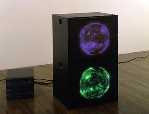 Magenta Green Suns , 2000 Two (2) video monitors, two (2) media players Dimensions variable 