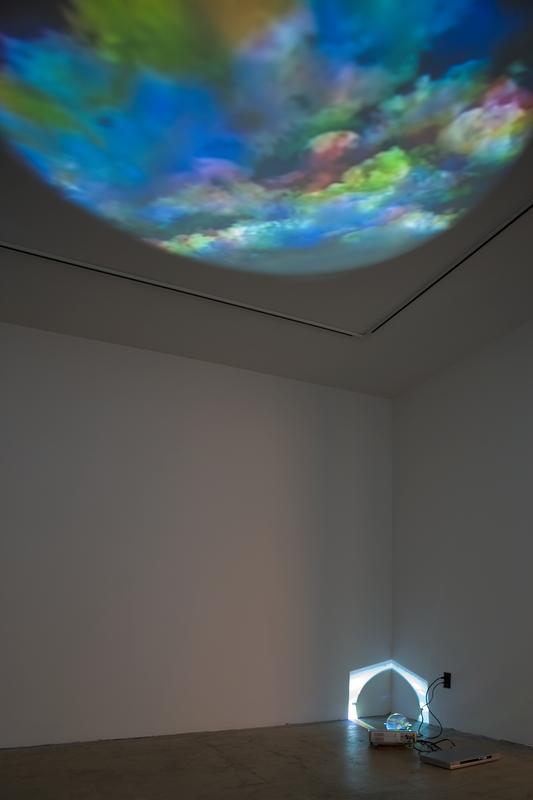 Oculus , 2001 One (1) video projector, one (1) media player, one (1) round mirror, Lee filters and existing architecture Installation view, 1301PE, Los Angeles, CA, 2008 Photo by Fredrik Nilsen