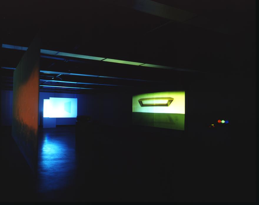 With/Out , 1990 Four (4) video projectors, four (4) media players, sand blasted glass, existing architecture Installation view, Art Center College of Design, Pasadena, CA, 1990 